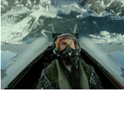 Top gun: a man wearing a mask flying a jet plane.